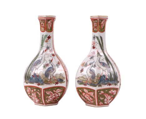 A pair of French Samson / Chantilly vases decorated in the Oriental style with birds and flowers, 21cms high.