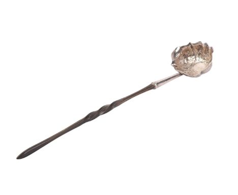 A Georgian silver toddy ladle with Baleen handle, 35cms long.