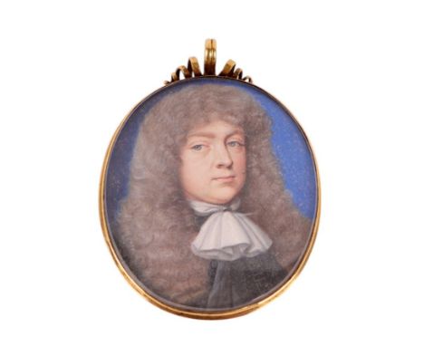 A fine early 18th century portrait miniature depicting a gentleman, on vellum / paper, in a yellow metal mount (tests as 18ct