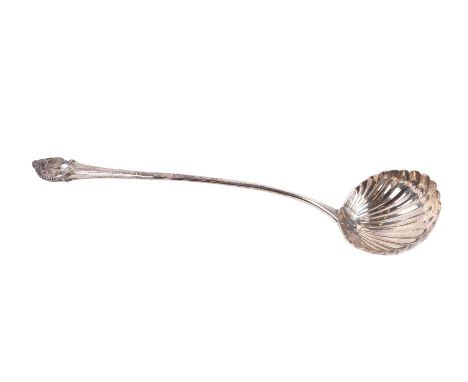A George III silver ladle with shell shaped bowl, indistinct London hallmarks and makers mark for William Fearn, 37cms long, 