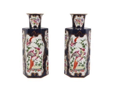A pair of Worcester Dr Wall style vases decorated with exotic birds and flowers, on a blue scale ground, of hexagonal form, p