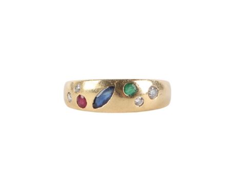 A yellow metal (tests as 18ct) diamond, ruby, sapphire and emerald ring, approx UK size N, 5.4g.