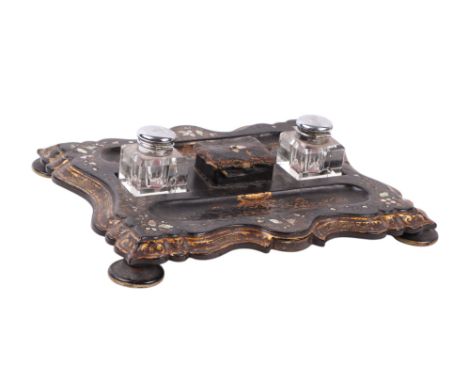 A Victorian Jennens & Bettridge papier-mâché desk stand with associated inkwells, 32cms wide; together with a burr walnut cro