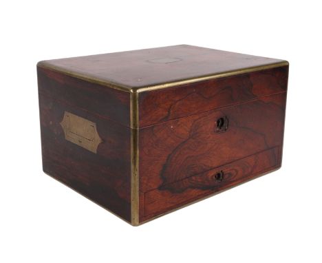 A Victorian brass bound rosewood toilet box with fitted interior containing silver mounted jars and bottles, 28cms wide.Condi