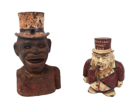A cast iron figural money box, 21cms high; together with another similar, 15cms high (2). Notice from the the-saleroom.com: T