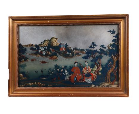 A Chinese reverse decorated silvered mirror picture depicting a courting couple beside a lake, framed, 43 by 27cms.Condition 