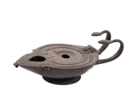 A 19th century Grand Tour type novelty mechanical oil lamp after the antique in the Egyptian Revival taste with twin serpent 