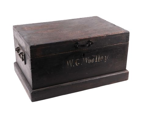 A Victorian stained pine miniature trunk with internal tray, the front stencilled 'W. G. Woolley', 50cms wide.