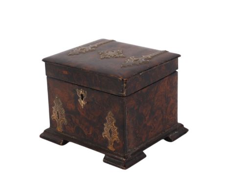 An early 19th century papier-mâché faux burr walnut painted tea caddy with internal lid and brass mounts, 13cms wide.