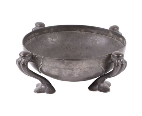 An Arts & Crafts Tudric pewter bowl designed by Oliver Baker, 26cms diameter.