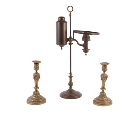 A pair of 19th century French gilded bronze candlesticks, 23.5cms high; together with a Regency style gilt bronze twin-arm wa