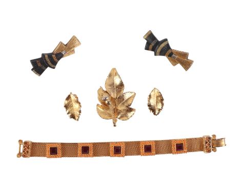 A pair of Kiki McDonough Art Deco inspired silver gilt enamel lapel badges; together with an Italian gold plated filigree and
