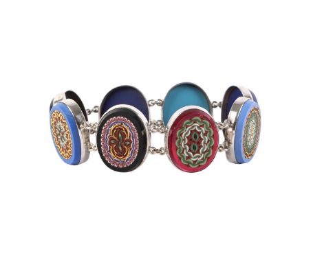An Italian white metal mounted micromosaic panel bracelet, 18cms long.