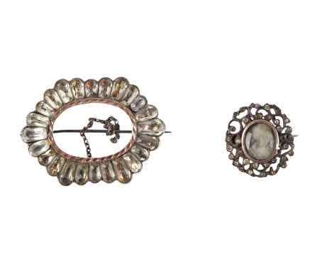 A 19th century black dot paste white and yellow metal mounted brooch, 4.5cms wide; together with a similar smaller with a cen