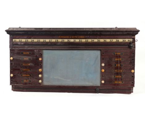 An early 20th century Burroughes & Watts, London, mahogany snooker score board, 112cms wide (a/f).