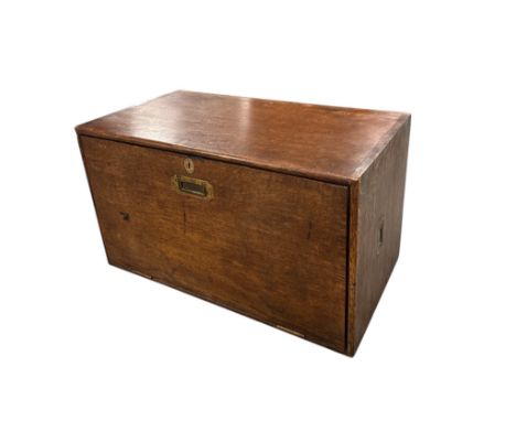 An oak trunk with fitted interior and recessed handles, 71cms wide.Condition ReportThere are minor scratches to the surface, 