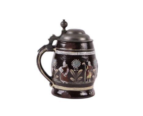 A German Creussen stoneware apostle stein with pewter lid, dated 1627, 15cms high.