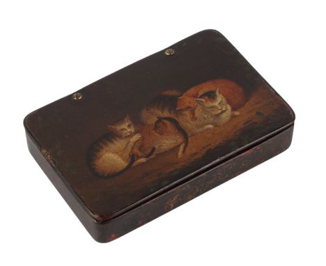 An early 19th century English papier-mâché snuff box, the lid painted with sleeping and playing cats, 8.5 by 5.5cms.