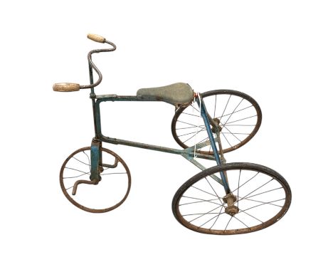 A vintage child's tricycle with spoked wheels and solid rubber tyres, 80cms long.