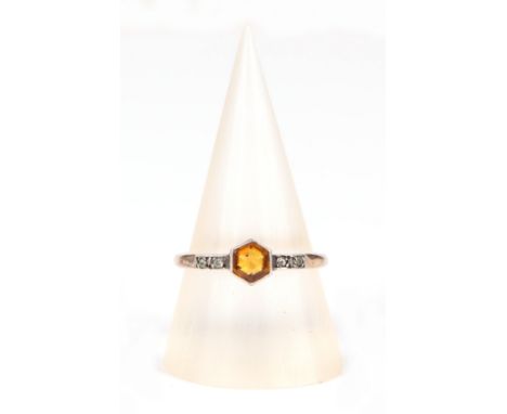 A 9ct gold and silver ring set with a central Citrine, approx UK size O, 1.8g.