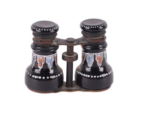 A Victorian novelty enamel inkwell in the form of a pair of binoculars, 7.5cms high.