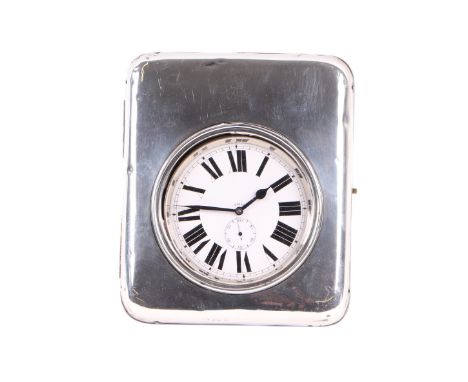 A very large nickel cased open faced Goliath pocket watch, the white enamel dial with Roman numerals and subsidiary seconds d