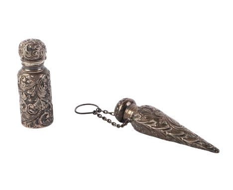 A Victorian silver chatelaine scent bottle of tapering form with embossed decoration; together with a similar silver scent bo