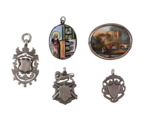 Three silver pocket watch fobs, 31g; together with a white metal mounted porcelain fragment pendant, and a white metal mounte