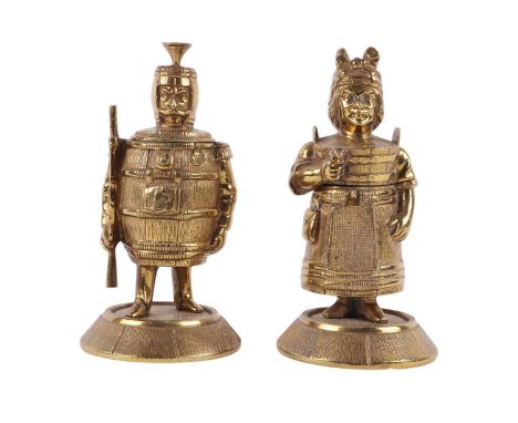 A pair of novelty gilt brass figural go-to-bed vesta holders, modelled as a man and woman, the man wearing a barrel, the woma