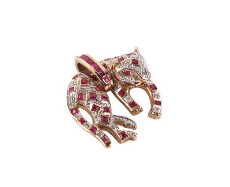 A 9ct gold diamond and ruby leopard pendant, 5.2g.