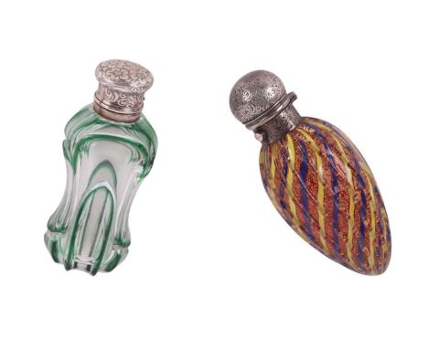 A Victorian unmarked silver ribbed glass scent bottle with internal blue, yellow and gilt cranberry decoration, 10cms high; t