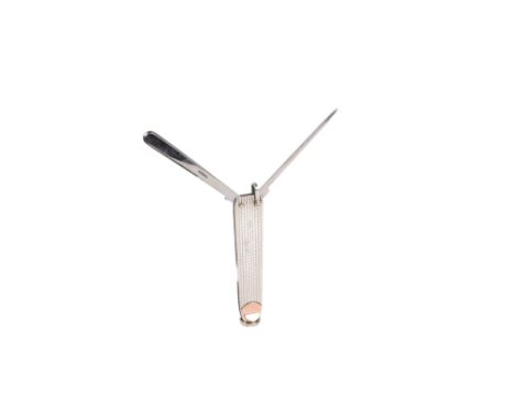 A Dunhill white and yellow metal mounted pipe knife / tamper, 7.5cms long.