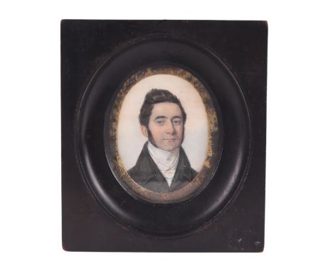 Continental school - a Regency portrait miniature of a young gentleman, in an ebonised frame, 7.5 by 9cms.