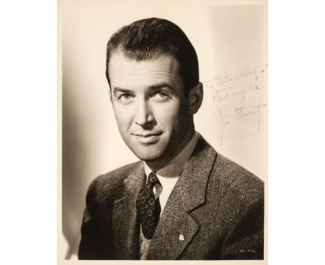 * Stewart (James, 1908-1997). A vintage signed and inscribed photograph, head and shoulders publicity shot in jacket and tie,
