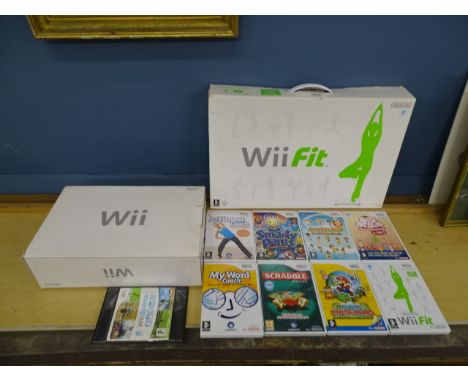 Boxed Nintendo Wii console with 9 games to include Super Paper Mario and balance board etc. All untested&nbsp;