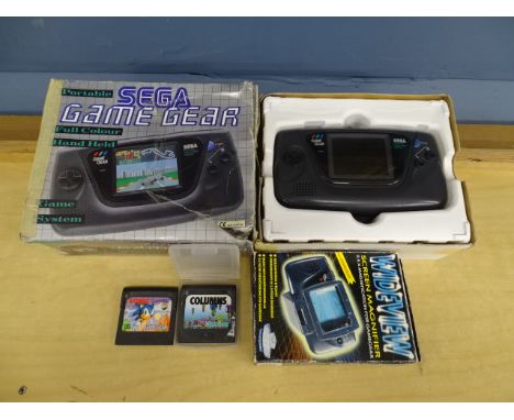 Boxed Sega Game Gear handheld console with 3 games (Columns, Sonic the Hedgehog and Chuck Rock) and screen magnifier. All unt