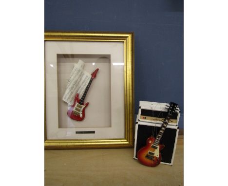 Box framed guitar and resin guitar ornament (Buddy Holly's guitar)