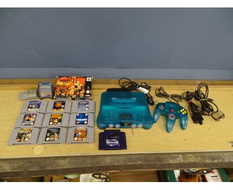Nintendo N64 transparent blue console with 10 games to include Donkey Kong 64, Pokemon Stadium and Body Harvest (boxed with m