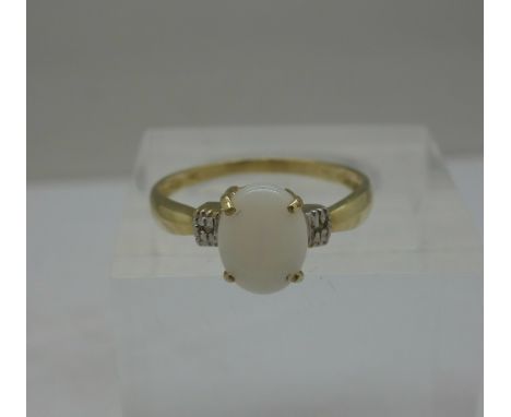 A 9ct gold, opal and diamond ring, weight 1.2g, size O