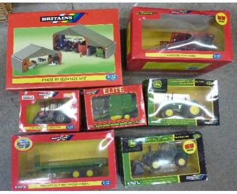 Seven Britains model tractors, etc., all boxed