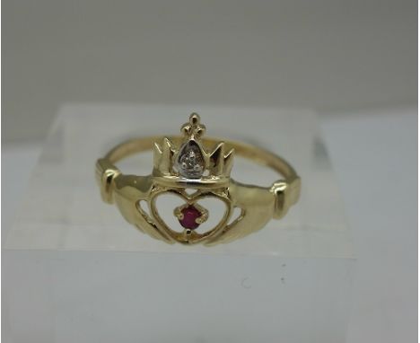 A 9ct gold, ruby and diamond Claddah ring, weight 1.3g, size N