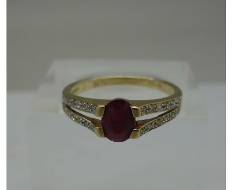 A 9ct gold, ruby and diamond ring, weight 2.6g, size P