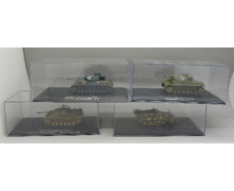 Nine model tanks, boxed