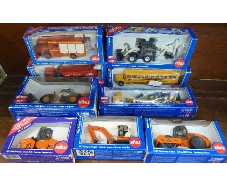 Nine Siku die-cast model vehicles, boxed