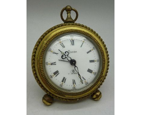 A Swiza 8 day 7 jewels travelling alarm clock