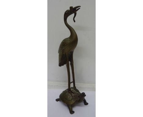A brass model of a pelican, height 24cm