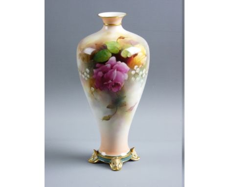 A ROYAL WORCESTER HAND PAINTED BALUSTER VASE by R Austin, having a gilt rim and neck band over a rose decorated body on four 