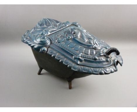A FRENCH CAST IRON COAL SCUTTLE with green enamel foliate decoration and interior foundry marks, raised on four stub feet, 52