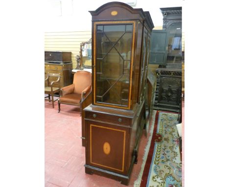 A REPRODUCTION MAHOGANY DISPLAY CABINET, the arched top with Sheraton fan inlay, a single glazed door glazed with thirteen as