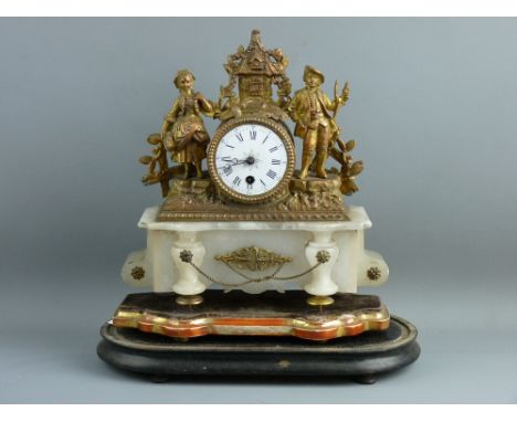 A FRENCH GILT METAL & ALABASTER MANTEL CLOCK with white enamel dial set with Arabic and Roman numerals, the drum cased pendul